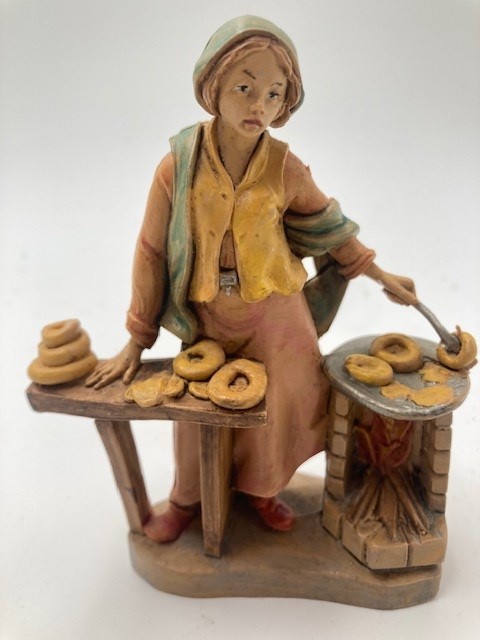 Statuina venditrice di ciambelle per Presepe da 10 cm.